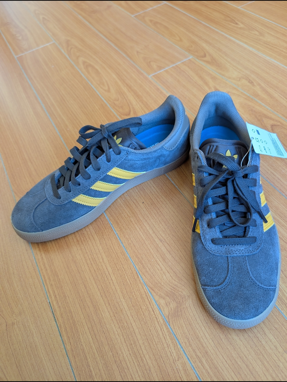 Adidas Men’s Gray Suede Sneakers with Yellow Stripes